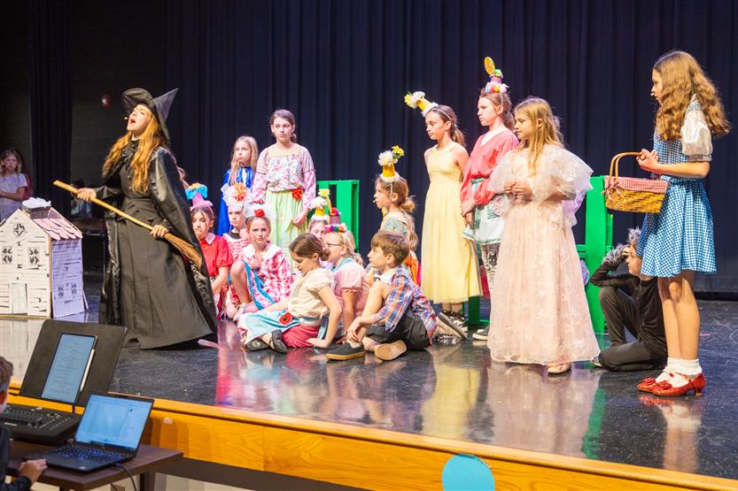 Students in a Wizard of Oz performance